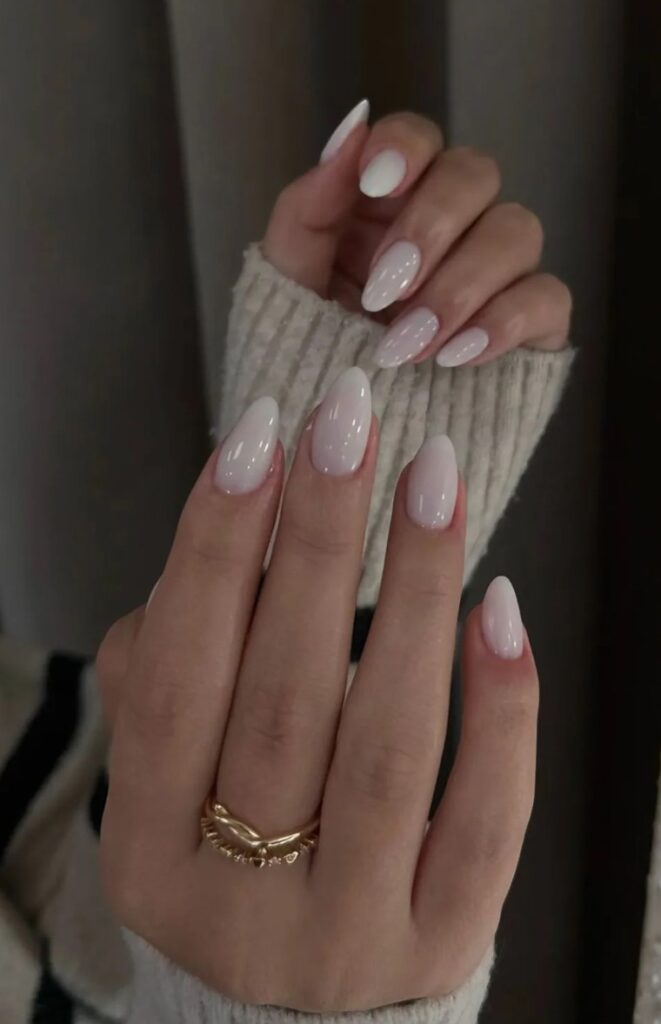 Elegant winter white executed flawlessly! It’s not just paper white or pearl—this has that luxurious milk glass appearance that's trending in nail designs right now.